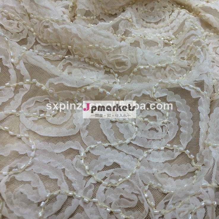 ivory color beaded and chiffon tape coiling embroidery on polyester mesh fabric for children's wear問屋・仕入れ・卸・卸売り