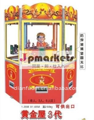 硬貨はアーケード・ゲームの機械金の家3を作動させた問屋・仕入れ・卸・卸売り