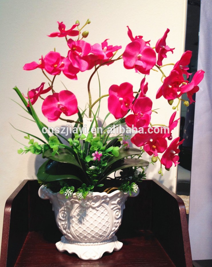 と白い陶製の花瓶蝶蘭の花-造花問屋・仕入れ・卸・卸売り